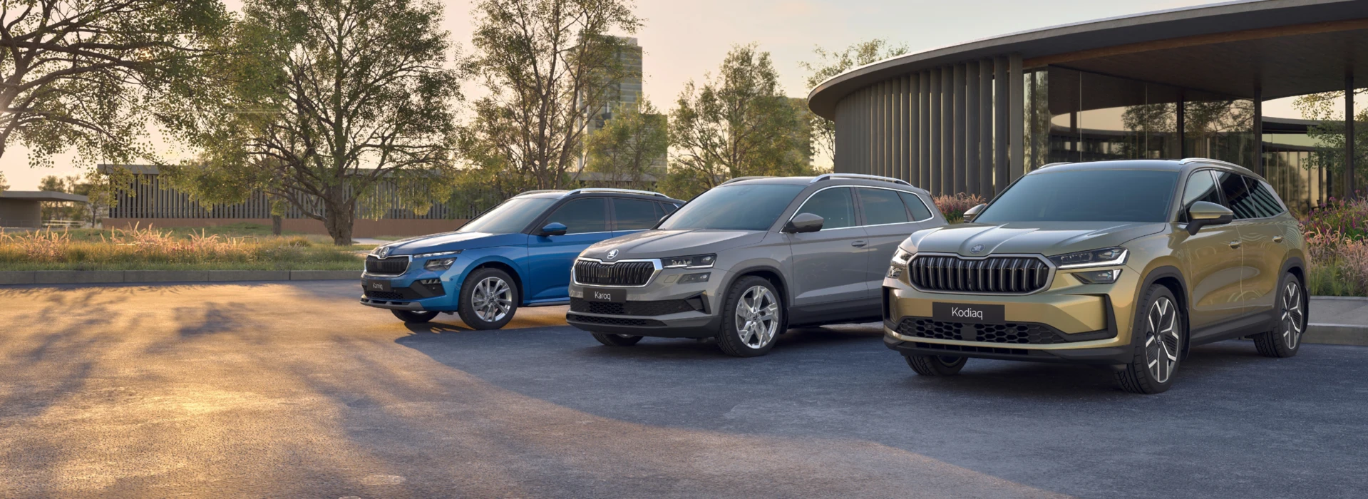 Škoda Kamiq, Karoq and Kodiaq parked up on a public drive on a summery evening