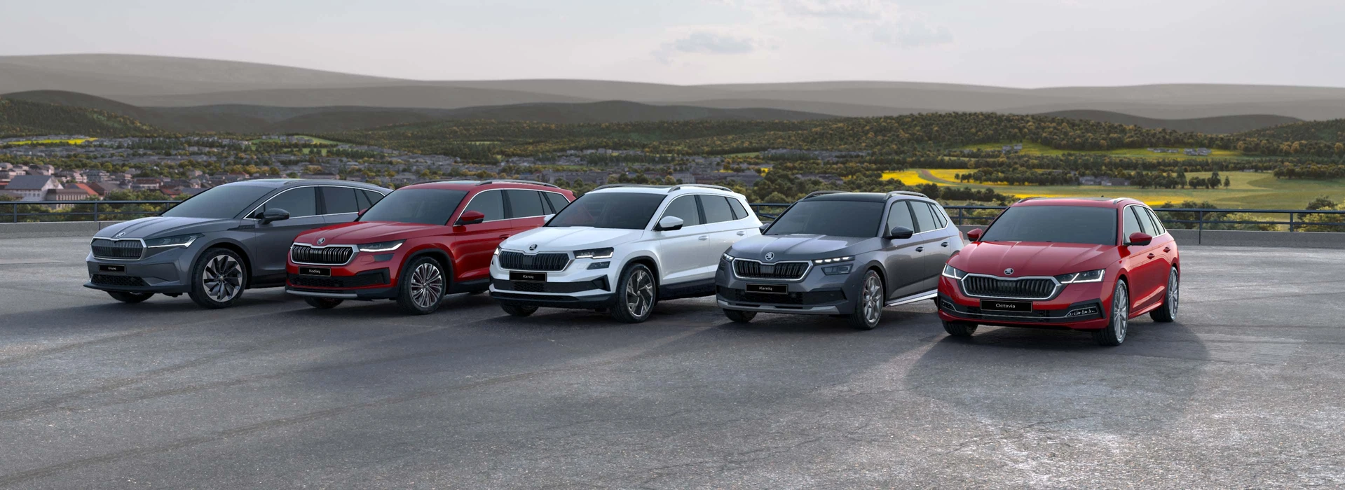 Five Škoda models including grey Enyaq, red Kodiaq, and white Karoq.